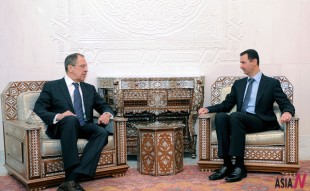 Syria's President Bashar al-Assad (R) talks with Russian Foreign Minister Sergei Lavrov at the presidential palace in Damascus, Syria, Feb. 7, 2012.