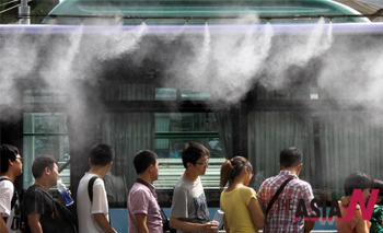 Water Sprayer Turned To Keep People Cool In China