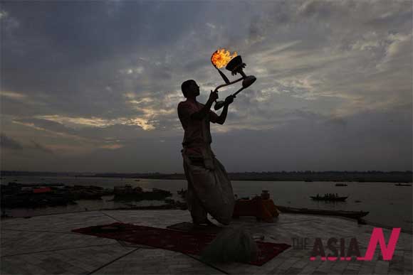 Hindu Priest’s Morning Prayer In Varanasi