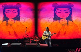 The rock band "Miserable Faith" performs during the 2013 Canal Kylin International Music Festival in Beijing, capital of China, Oct. 1, 2013. The music festival kicked off in the Tongzhou canal park on Tuesday. (Xinhua/NEWSis)