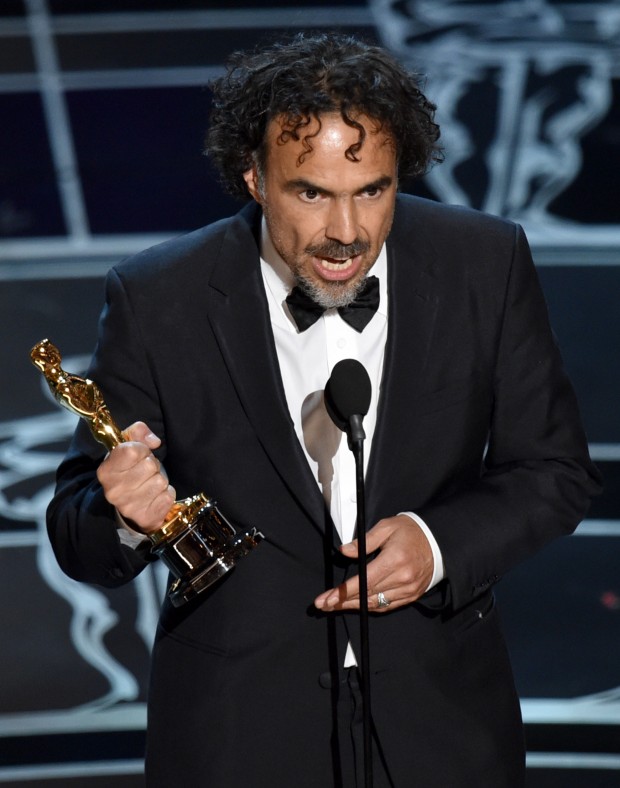 Alejandro G. Inarritu accepts the award for best director for Birdman or (The Unexpected Virtue of Ignorance) at the Oscars on Sunday, Feb. 22, 2015, at the Dolby Theatre in Los Angeles. (Photo by John Shearer/Invision/AP)