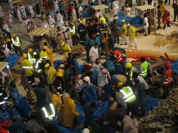 Saudi emergency teams gather inside the Grand Mosque of Saudi Arabia's holy Muslim city of Mecca after a construction crane crashed into it. pilgrims were killed and 201 others were injured when a crane fell on the grand mosque in Mecca, Saudi Arabia's Civil Defence authority said Friday. Al Arabiya Television earlier said the crane had fallen because of strong storms. Saudi Arabia has been hit by strong sand storms in the last few days. (Xinhua/Str.) 