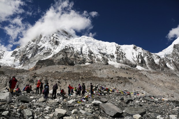 Nepal is considering placing age and fitness limits for people who want to climb Mount Everest. Last week Japanese climber Nobukazu Kuriki, who had lost nine fingers to frostbite, abandoned his fifth unsuccessful attempt to scale Everest. Everest climbing permits earn the impoverished nation millions of dollars but the government has come under criticism after a series of disasters over the last few years. (AP Photo/Tashi Sherpa, file)