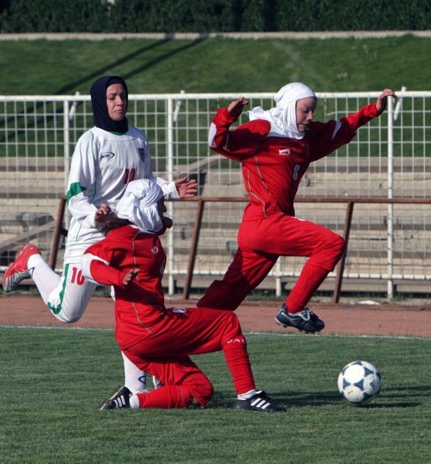 Niloufar Ardalan in a  friendly match at the Ararat stadium in Tehran, Iran. Iranian womens soccer captain Ardalan reportedly will miss the Asian Cup tournament as her husband has confiscated her passport in a domestic quarrel, according to a report by he Iranian news website fararu.com on Monday, Sept. 16, 2015.(AP Photo)