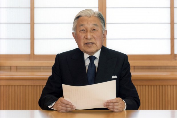 In this photo taken Sunday, Aug. 7, 2016 and provided by the Imperial Household Agency of Japan on Monday, Aug. 8, 2016, Japan's Emperor Akihito reads a message for recording at the Imperial Palace in Tokyo. Akihito expressed concern about fulfilling his duties as he ages in an address to the public in a 10-minute recorded speech broadcast on national television Monday that was remarkable for its rarity and its hinted possibility that he may want to abdicate in a few years. (Imperial Household Agency of Japan via AP)