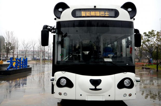 Photo taken on February 26, 2019 shows a bus resembling a panda stops at a square in Ganjiang New Area in Nanchang, east China’s Jiangxi province. What attracts people is not only its shape, but also the technological elements of this smart bus. Equipped with more than 10 of the world’s top technologies, it can realize automatic driving. Passengers can pay by simply placing their palms on the identification device. The bus also has a smart unmanned vending machine, through which passengers can buy beverages, food and other goods only by scanning their fingerprints. (Photo from People’s Daily Online)