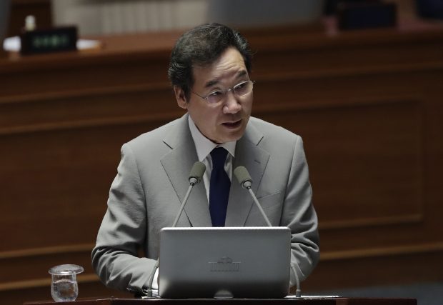 South Korean Prime Minister Lee Nak-yon answers questions during a plenary session for interpellation session at National Assembly in Seoul, South Korea, Tuesday, July 9, 2019. (AP Photo/Lee Jin-man)