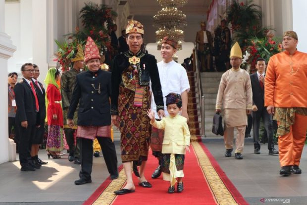 President Joko Widodo wears Balinese traditional clothing before the commemoration of the 74th Anniversary of the Republic of Indonesia (ANTARA) 