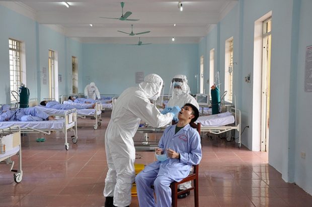 Doctors-treat-a-patient-at-a-makeshift-hospital-during-an-exercise-for-COVID-19-prevention-in-Hanoi-March-4-2020-1.jpg