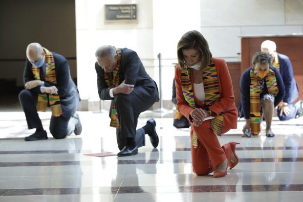 Democrats wearing Kente cloth while kneeling for George Floyd