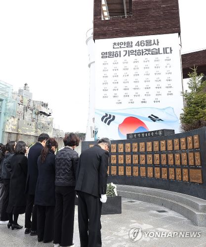 Family members paying tribute to their fallen heroes