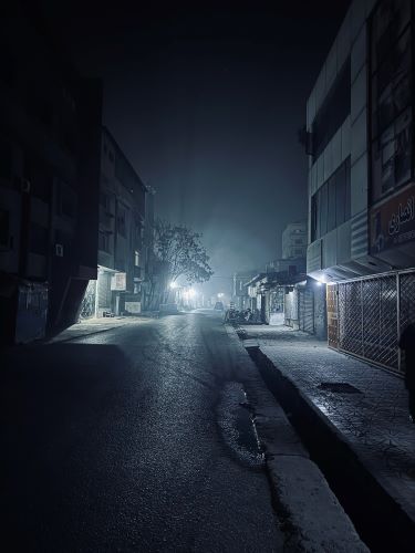 As night falls, the streets of Kabul become deserted. Small lights are twinkling through the deep darkness and fog. The city of Kabul was always thick with smog due to car exhaust during the day and smoke from cheap fossil fuels at night.